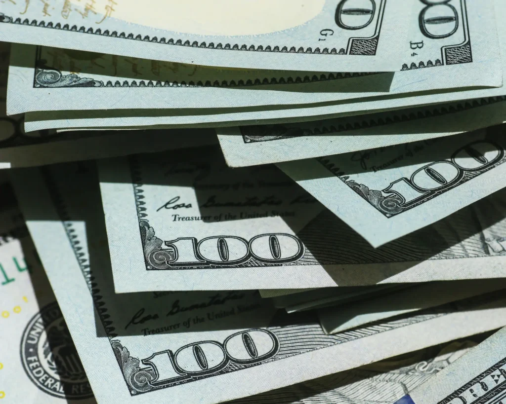 A pile of $100 bills